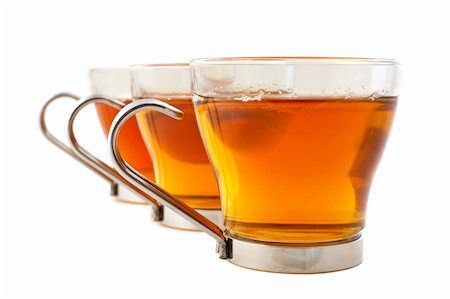 simsearch:400-04273561,k - Three glass cups of tea. Shallow dof Stock Photo - Budget Royalty-Free & Subscription, Code: 400-03912921