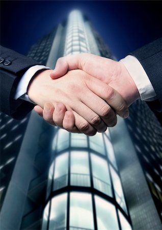 simsearch:400-04434336,k - business hand shake and a office in background Stock Photo - Budget Royalty-Free & Subscription, Code: 400-03913558