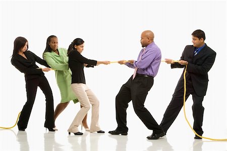 simsearch:632-05604001,k - Multi-ethnic businessmen playing tug of war against businesswomen. Stock Photo - Budget Royalty-Free & Subscription, Code: 400-03924400
