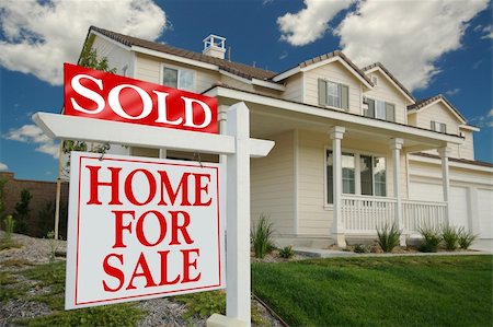 sold sign - Sold Home For Sale Sign in front of Beautiful New Home. Stock Photo - Budget Royalty-Free & Subscription, Code: 400-03924621