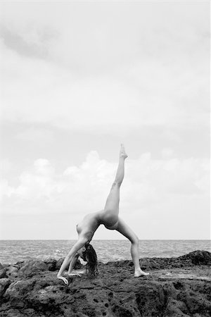 simsearch:400-04450827,k - Sexy nude Caucasian woman doing backbend on beach in Maui, Hawaii. Stock Photo - Budget Royalty-Free & Subscription, Code: 400-03924818