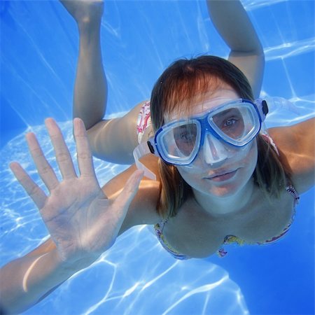 simsearch:6113-07147417,k - Pretty girl in bikini underwater in blue pool Stock Photo - Budget Royalty-Free & Subscription, Code: 400-03924914