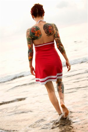 simsearch:400-04450827,k - Attractive tattooed Caucasian woman on beach in Maui, Hawaii, USA. Stock Photo - Budget Royalty-Free & Subscription, Code: 400-03925179