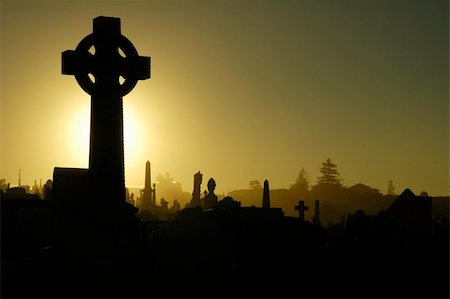 simsearch:400-04032243,k - dusk at cemetery, black and yellow tonality, cross in foreground Stock Photo - Budget Royalty-Free & Subscription, Code: 400-03925631