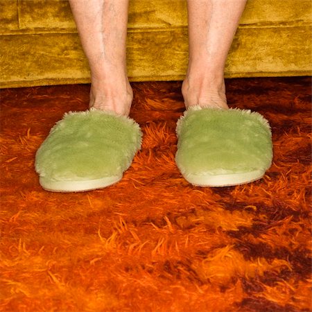 simsearch:400-04450069,k - Caucasian senior female feet wearing green bedroom slippers on carpet. Stock Photo - Budget Royalty-Free & Subscription, Code: 400-03925668