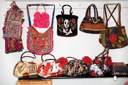 Unique handbags hanging in retail store. Stock Photo - Budget Royalty-Free & Subscription, Code: 400-03925673