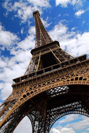 simsearch:841-06343131,k - Eiffel tower on background of blue sky in Paris, France. Stock Photo - Budget Royalty-Free & Subscription, Code: 400-03926354