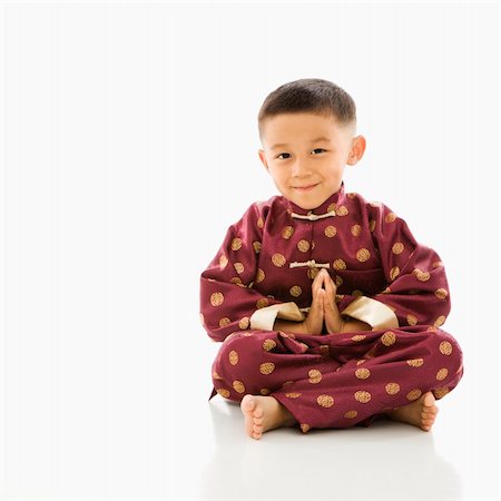 filipino clothing in male - Asian boy sitting meditating against white background in traditional  attire. Stock Photo - Budget Royalty-Free & Subscription, Code: 400-03926477