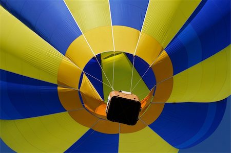 simsearch:873-06440549,k - Close-up view of a colorful hot air balloon lifting off Photographie de stock - Aubaine LD & Abonnement, Code: 400-03927044