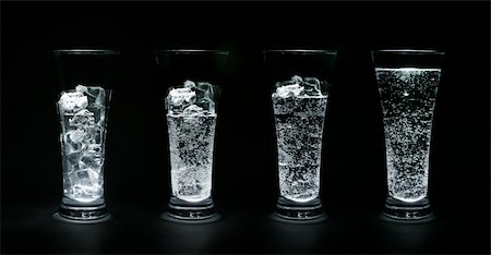 simsearch:614-06002054,k - Four glasses filled up with ice and water Stock Photo - Budget Royalty-Free & Subscription, Code: 400-03928067