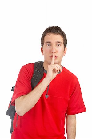 simsearch:400-04505681,k - Teen student with a black backpack, making a gesture to be silence Stock Photo - Budget Royalty-Free & Subscription, Code: 400-03929309