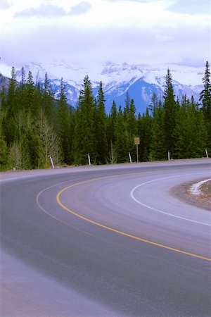 ramps on the road - Turn of an empty mountain road in winter Stock Photo - Budget Royalty-Free & Subscription, Code: 400-03929387
