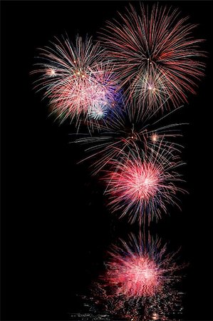 simsearch:400-04219011,k - Firework display at night with water reflection Stock Photo - Budget Royalty-Free & Subscription, Code: 400-03920639