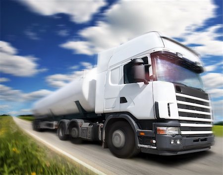 truck driving on country-road/motion Foto de stock - Super Valor sin royalties y Suscripción, Código: 400-03920678