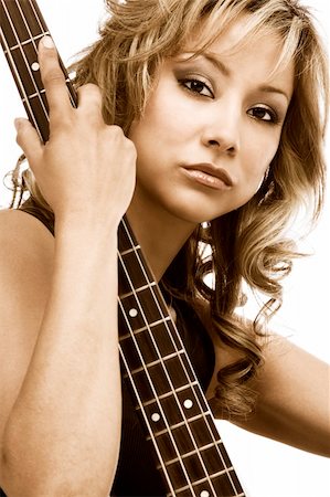 simsearch:400-04652753,k - Latina blonde Girl sitting with bass guitar Stock Photo - Budget Royalty-Free & Subscription, Code: 400-03922267