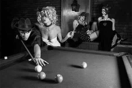 show-off (female) - Prime adult Caucasian retro male shooting pool with three Caucasian prime adult retro females watching. Stock Photo - Budget Royalty-Free & Subscription, Code: 400-03922732