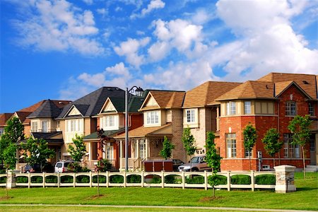 Row of new residential houses in suburban neighborhood Stock Photo - Budget Royalty-Free & Subscription, Code: 400-03923361