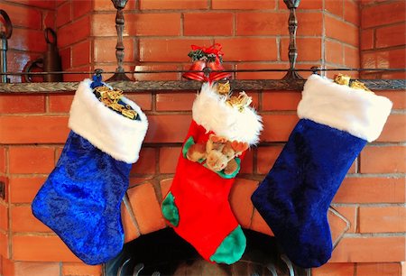Christmas stockings on the fireplace Stock Photo - Budget Royalty-Free & Subscription, Code: 400-03935047