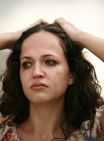 The lonely girl cries in the street Stock Photo - Budget Royalty-Free & Subscription, Code: 400-03935054