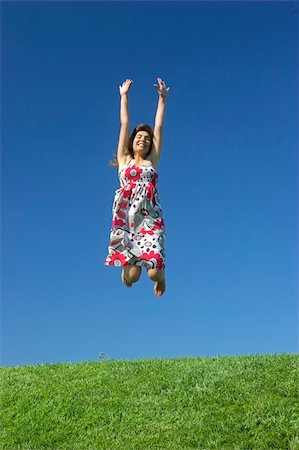 simsearch:400-03934248,k - Happy woman on a beautiful green meadow Stock Photo - Budget Royalty-Free & Subscription, Code: 400-03935200