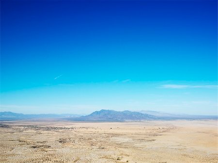 simsearch:400-03948680,k - Aerial view of remote California desert with mountain range in background. Stock Photo - Budget Royalty-Free & Subscription, Code: 400-03935666