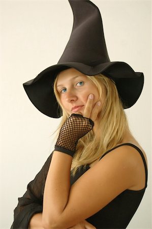 simsearch:700-00262810,k - Pretty young witch. She put a spell on you :)  Party, Carnival and Halloween concept. Stock Photo - Budget Royalty-Free & Subscription, Code: 400-03936479