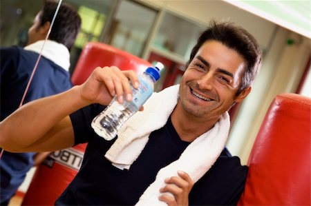 simsearch:400-05115517,k - health club: athlete relaxing and drinking some water Stock Photo - Budget Royalty-Free & Subscription, Code: 400-03936753