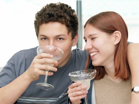 2 teenagers drinking margarita Stock Photo - Budget Royalty-Free & Subscription, Code: 400-03937428