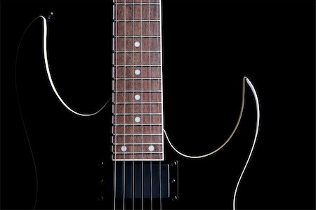 fret - electric guitar silhouette closeup isolated on black Stock Photo - Budget Royalty-Free & Subscription, Code: 400-03938172