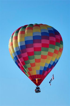 simsearch:400-06642893,k - A hot-air balloon flying the flags of UK, USA, EU and France. The pilot is operating the burner. Foto de stock - Super Valor sin royalties y Suscripción, Código: 400-03938937