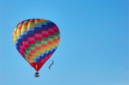 simsearch:400-06642893,k - A hot-air balloon flying the flags of UK, USA, EU and France. The pilot is operating the burner. Foto de stock - Super Valor sin royalties y Suscripción, Código: 400-03938938