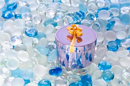 simsearch:400-04499144,k - Shiny fancy box on white and blue glass balls Stock Photo - Budget Royalty-Free & Subscription, Code: 400-03930456