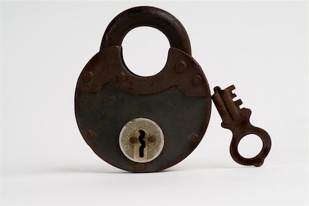 simsearch:600-03445182,k - Old Padlock and Key Isolated on white Stock Photo - Budget Royalty-Free & Subscription, Code: 400-03930721