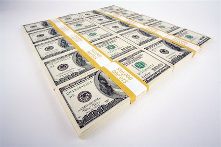 simsearch:400-07218287,k - Stacks of Hundred Dollar Bills on a white background. Stock Photo - Budget Royalty-Free & Subscription, Code: 400-03931388