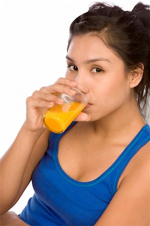 simsearch:400-04398921,k - Latina girl drinking orange juice from glass Stock Photo - Budget Royalty-Free & Subscription, Code: 400-03931706