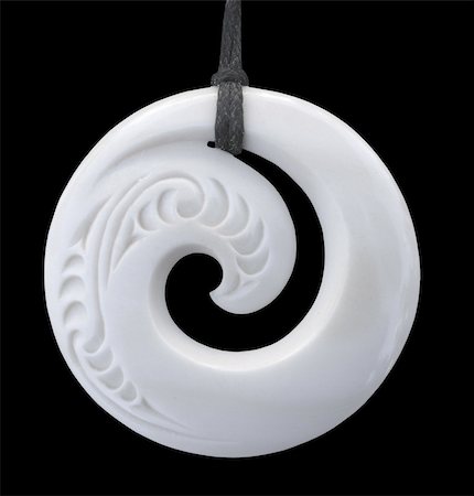 Modern Maori koru design bone pendant with clipping path Photographie de stock - Aubaine LD & Abonnement, Code: 400-03932035