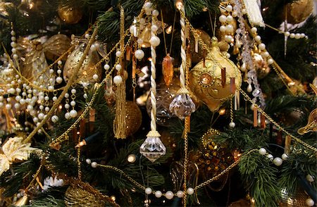 simsearch:614-02241057,k - Christmas fur-tree decorated by set of gold ornaments, spheres and toys Stock Photo - Budget Royalty-Free & Subscription, Code: 400-03932173