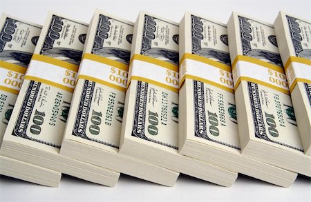 simsearch:400-04268399,k - Stacks of One Hundred Dollar Bills on a white background Stock Photo - Budget Royalty-Free & Subscription, Code: 400-03932737