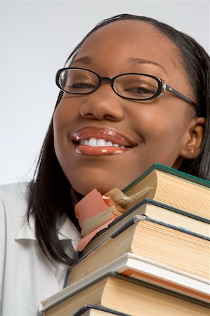 simsearch:400-04860880,k - Female Student rests her head on stack of books Stock Photo - Budget Royalty-Free & Subscription, Code: 400-03933080