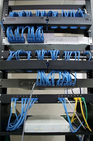 fibre optic - cabling rack with patch panels hubs and switches Stock Photo - Budget Royalty-Free & Subscription, Code: 400-03933865