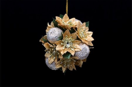 simsearch:614-02241057,k - A gold and silver christmas decoration photographed against a black background Stock Photo - Budget Royalty-Free & Subscription, Code: 400-03933899