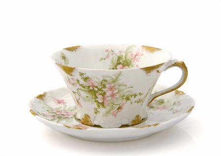 frail - Antique teacup and saucer with a floral pattern isolated on white Stock Photo - Budget Royalty-Free & Subscription, Code: 400-03933997