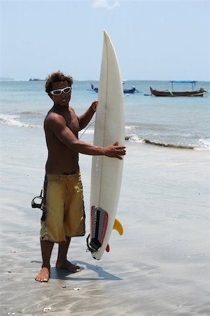 simsearch:400-03944633,k - Portrait young men - the surfer Stock Photo - Budget Royalty-Free & Subscription, Code: 400-03944634