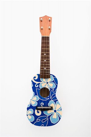 Ukulele painted with blue flowers in Hawaiian pattern. Stock Photo - Budget Royalty-Free & Subscription, Code: 400-03944776
