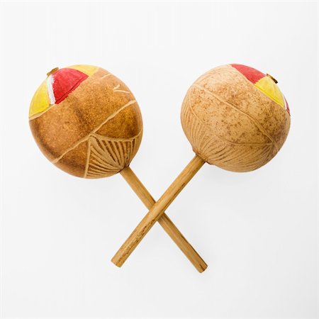 simsearch:6102-03748485,k - Pair of handmade Mexican maracas percussion musical instruments against white background. Stock Photo - Budget Royalty-Free & Subscription, Code: 400-03944815