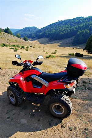red quad bike in nature Stock Photo - Budget Royalty-Free & Subscription, Code: 400-03945051