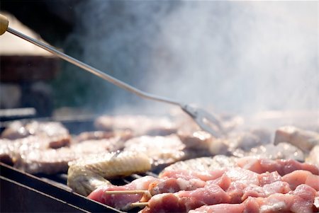 Close shot of hot fresh meat on grill Stock Photo - Budget Royalty-Free & Subscription, Code: 400-03945923