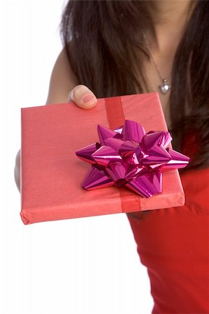 simsearch:622-06190925,k - Close up of woman handing wrapped gift Stock Photo - Budget Royalty-Free & Subscription, Code: 400-03947296