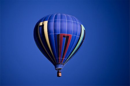 simsearch:700-00056968,k - a blue hot air balloon against a blue sky Stock Photo - Budget Royalty-Free & Subscription, Code: 400-03947816