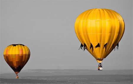 simsearch:700-00056968,k - two hot air balloons fly above the northern new mexico desert Stock Photo - Budget Royalty-Free & Subscription, Code: 400-03947817